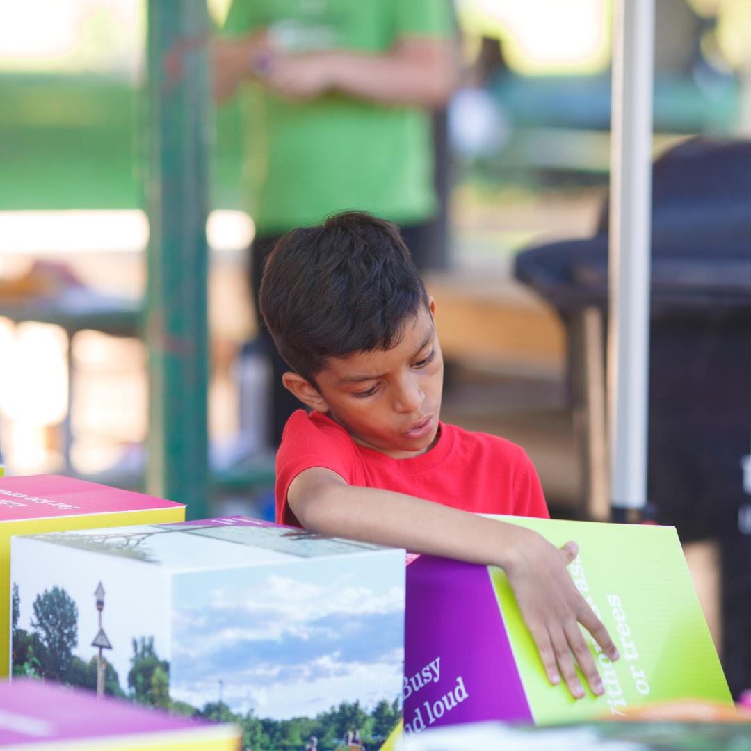 boy examining box