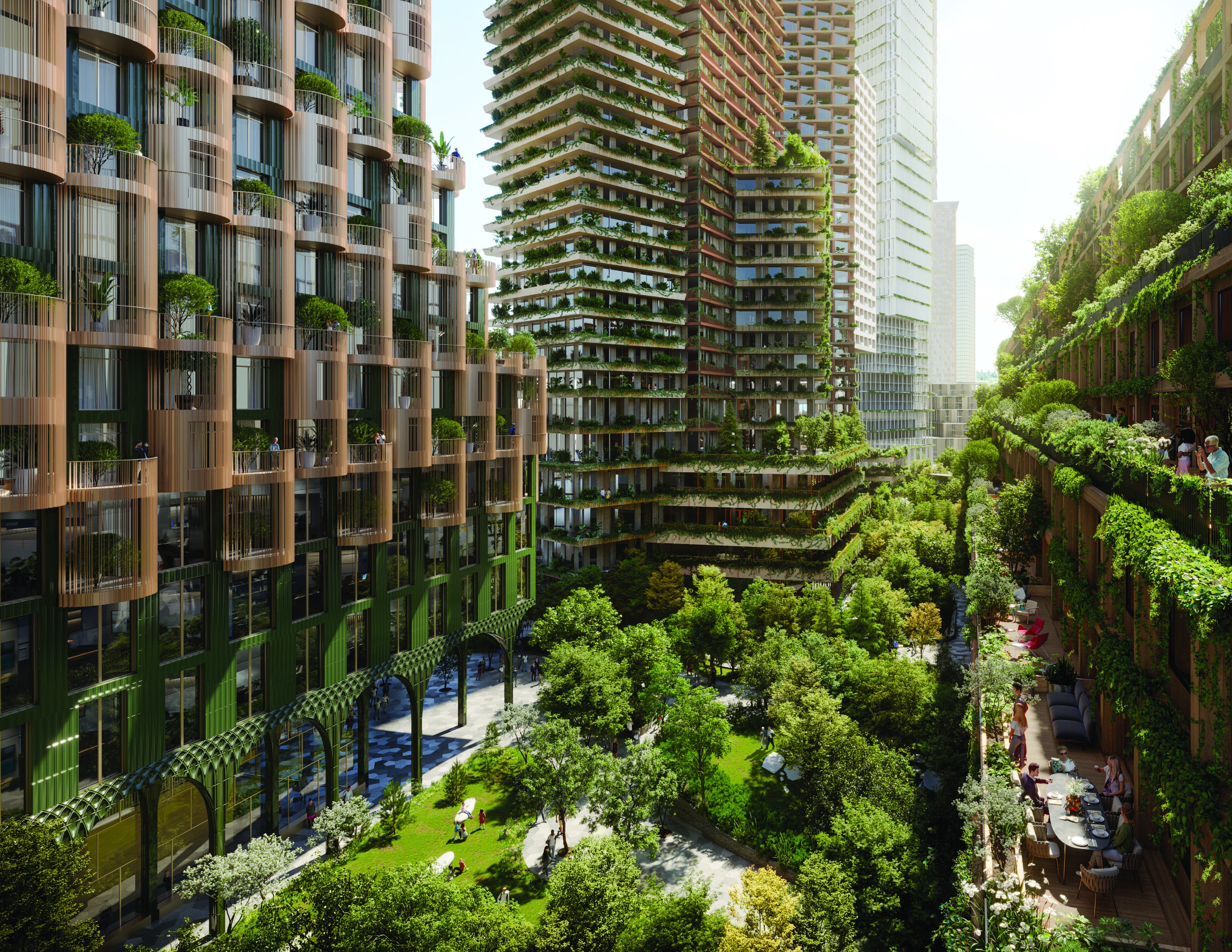 View of green buildings with trees in the valley and on the building galleries.