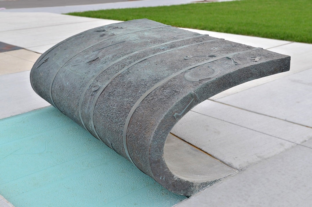 Close-up showing concrete peeled back and a light underneath
