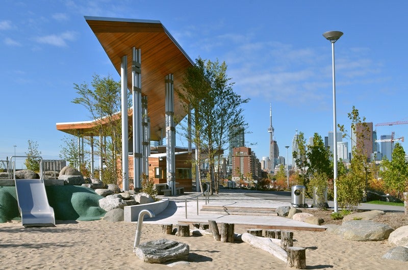 Corktown Common pavilion with view of city skyline