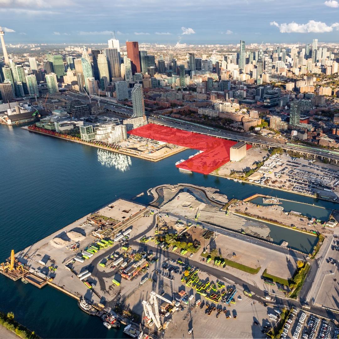 an aerial photo that shows the Toronto waterfront with the Quayside development site highlighted in red