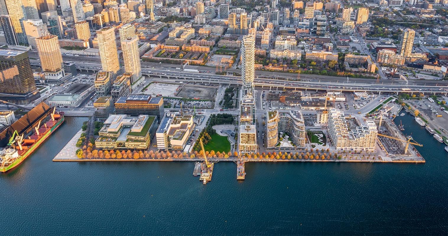 aerial photo of the East Bayfront precinct showing buildings, new parks and the water's edge