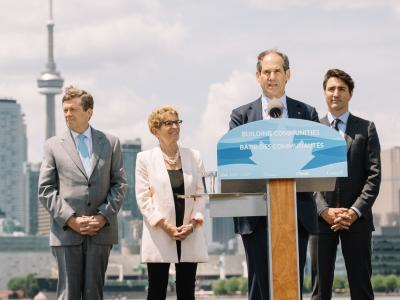 event photo of officials speaking at a podium