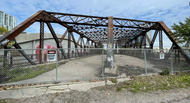 The existing old Eastern Avenue Bridge fenced off.